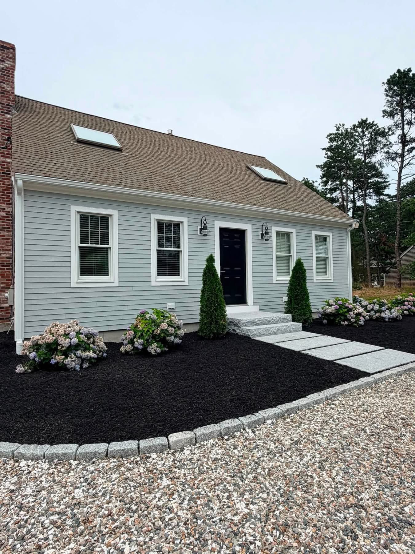 Front yard landscaping with hydrangeas
